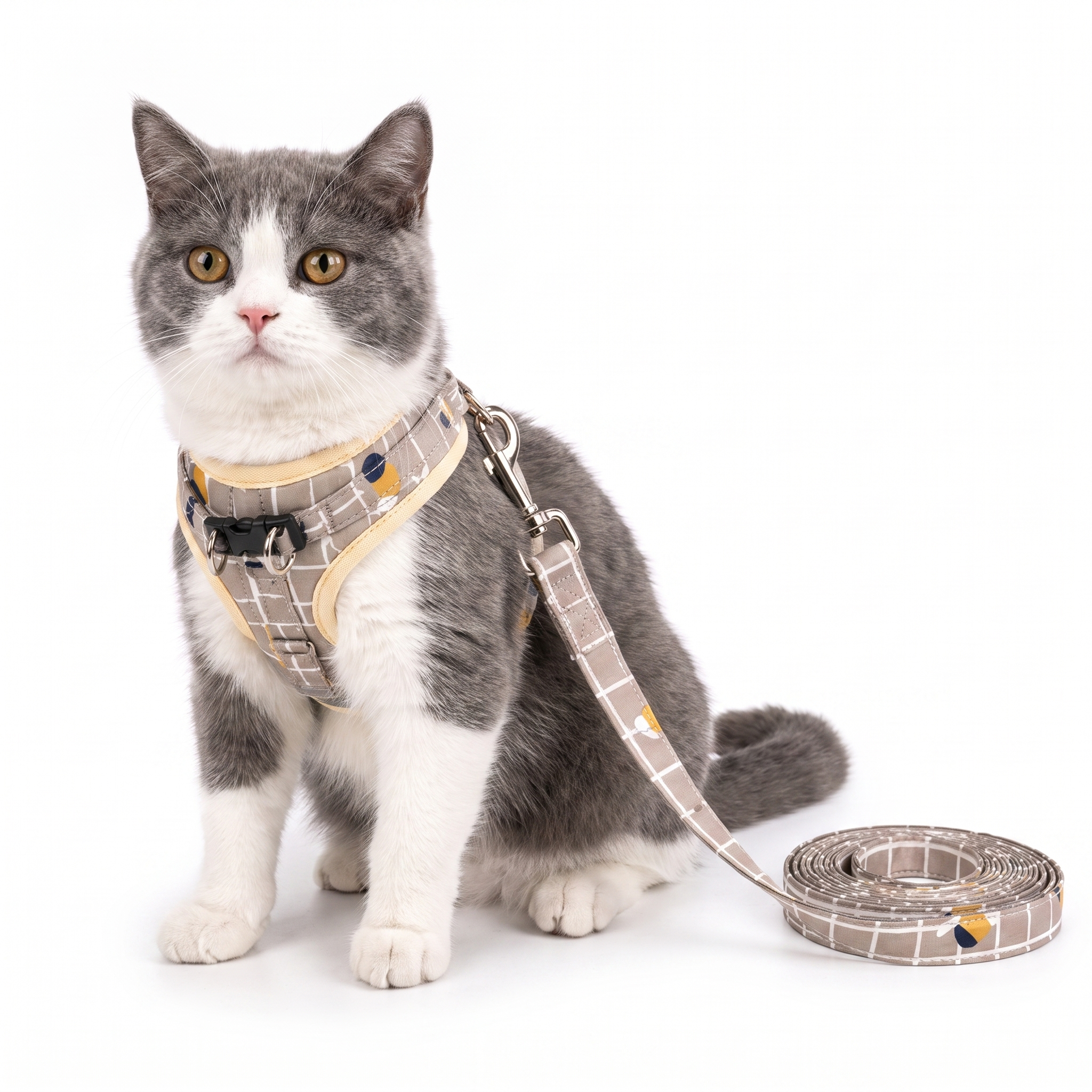 Cat wearing the Purrela Trek step-in plaid harness with matching leash
