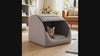 Cat settling into the Nook hooded cave bed