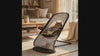 Cat relaxing as the Sway pet rocking chair gently rocks